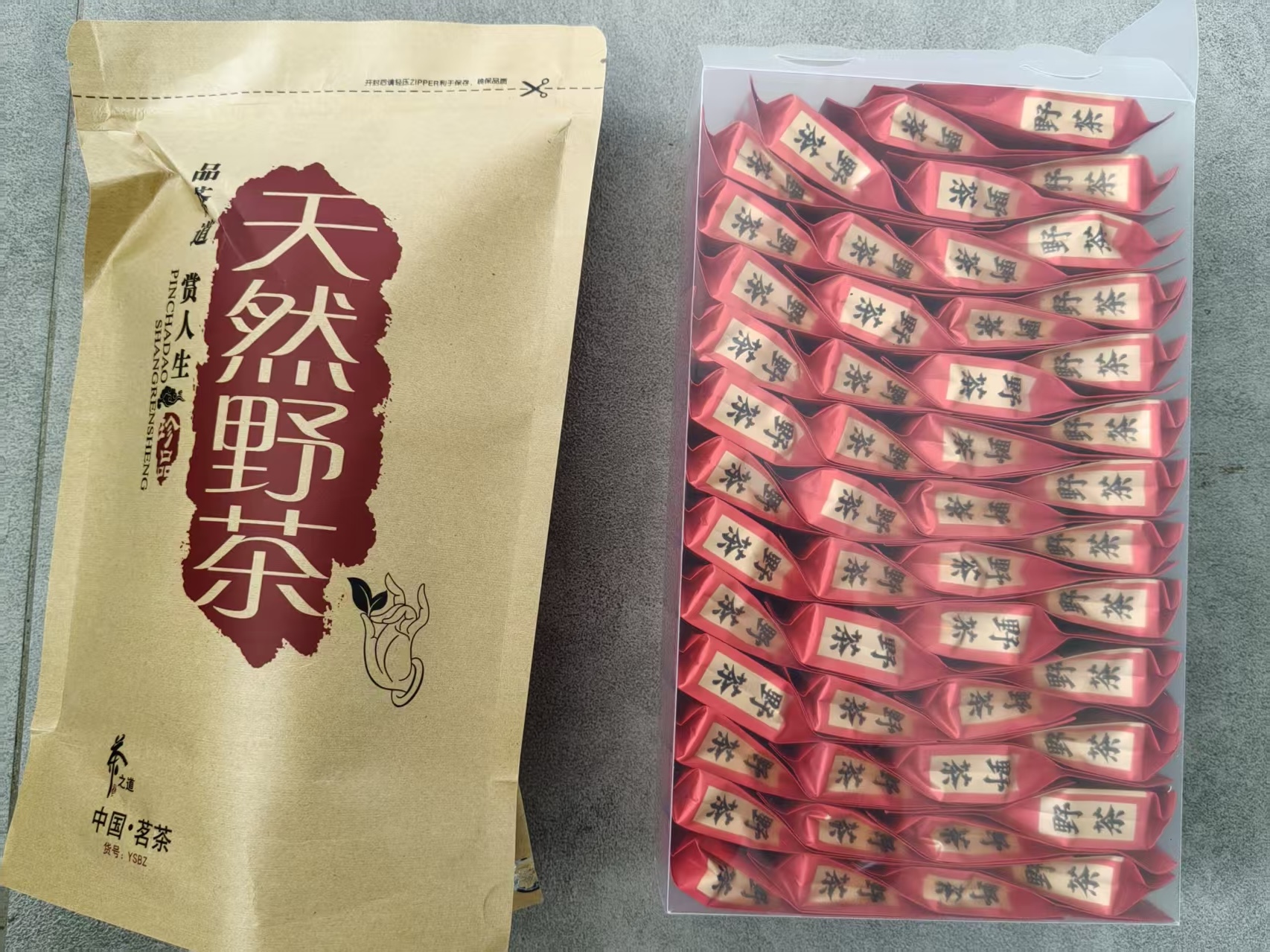 Packaged wild black tea and individual tea sachets